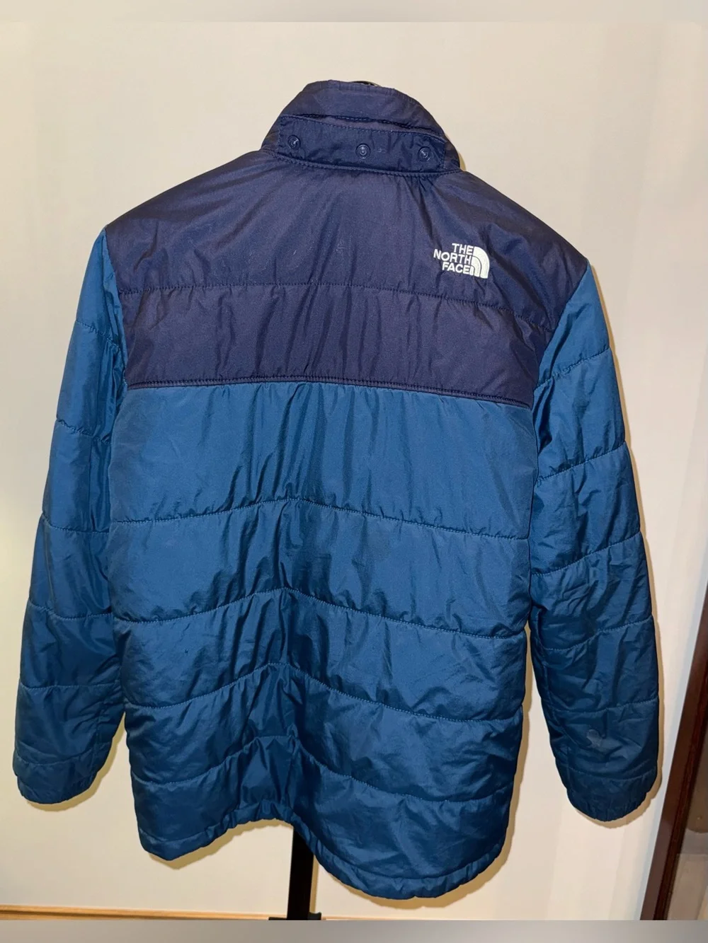 The North Face reversible puffer jacket with a soft, fleece lining, size 14/16